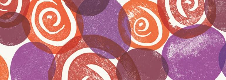 Purple, red, and orange stamped pattern of swirls and overlapping circles