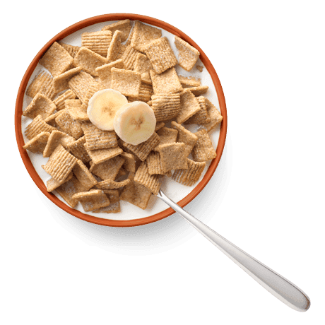 Cascadian Farm Graham Crunch Cereal in a bowl topped with banana