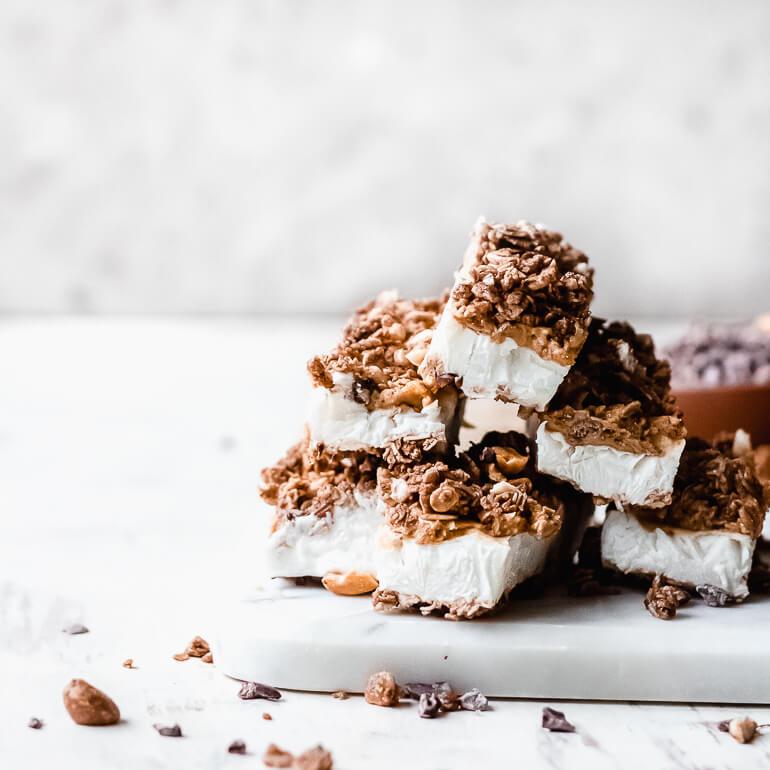 Image of a pile of frozen chocolate peanut butter bars made with Cascadian Farm Organic Dark Chocolate Almond Granola